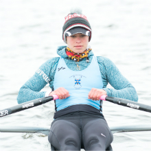 Female athlete rowing boat