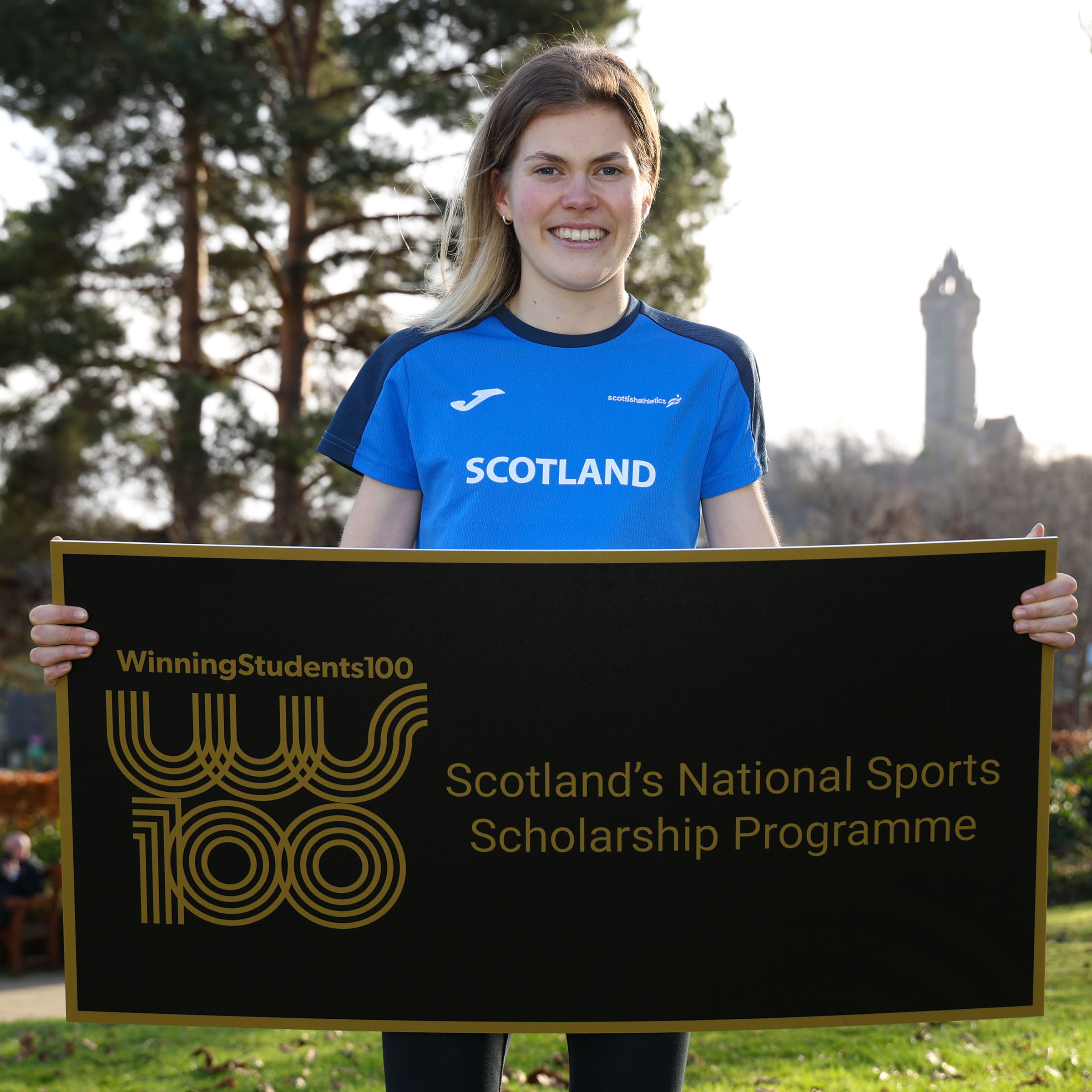 Athletics scholar Megan Keith poses for camera during the launch event.